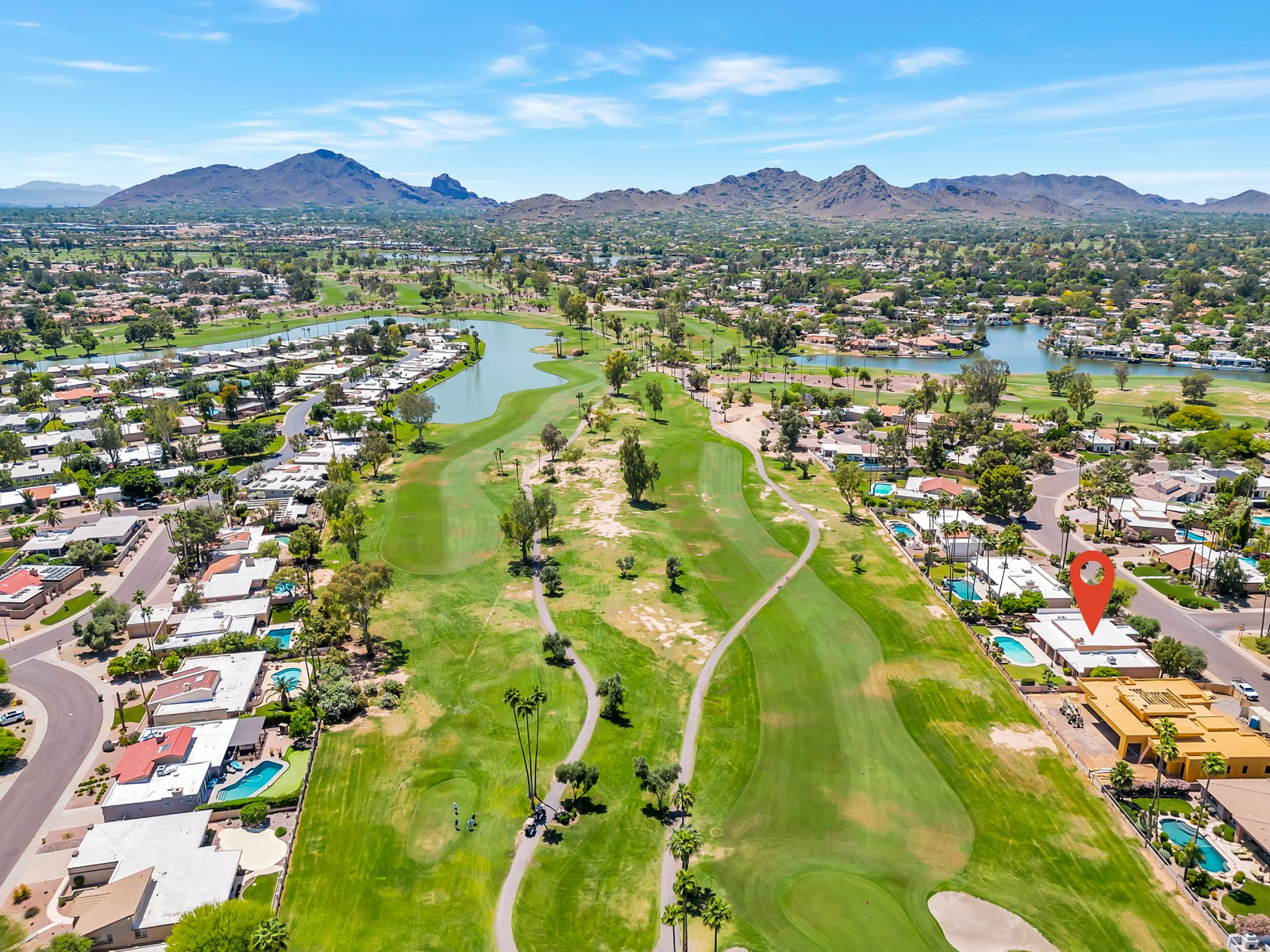 An aerial view of a golf course in Scottsdale, Arizona with a golf course lot in McCormick Ranch.