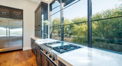 Silverleaf at DC Ranch, a luxury residential community in Scottsdale, offers a kitchen with stainless steel appliances and large windows.